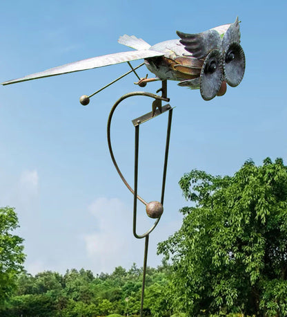 Metal Bird Wind Spinner Garden Ornament featuring moving wings, crafted from weather-resistant metal for durable outdoor decor, ideal for enhancing garden aesthetics. 7