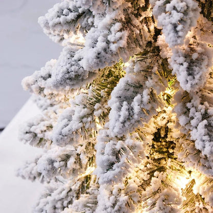Mini Christmas tree with LED lights and snow effect, 45 cm tall, perfect for compact table decor and holiday decorations. 5