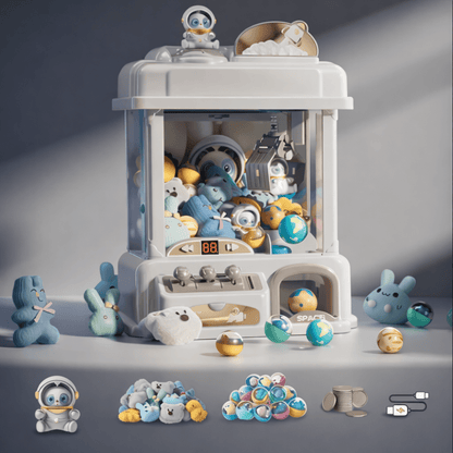 Mini claw machine toy for kids featuring coin-operated functionality, designed as an arcade claw game that dispenses plush prizes, perfect for home play and entertainment. 1