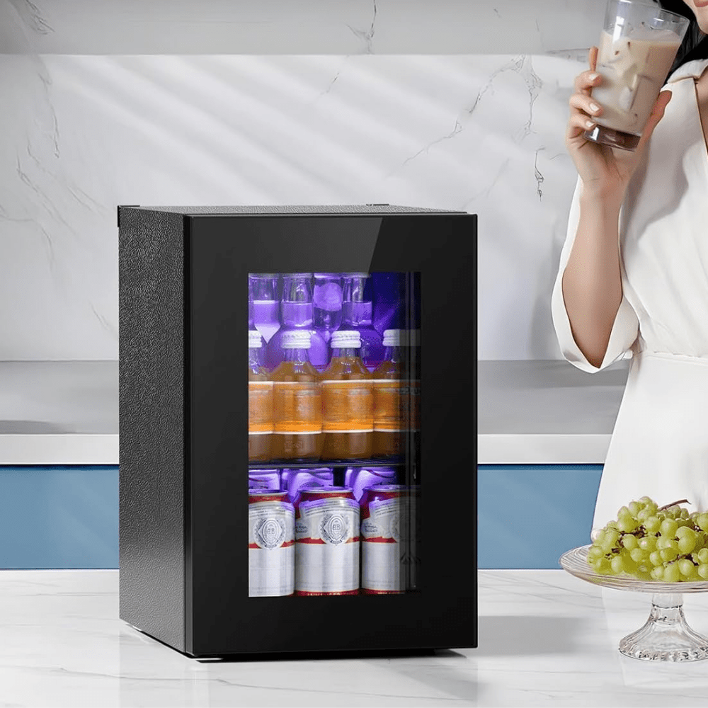Mini fridge beverage cooler featuring adjustable temperature control and a sleek glass door, ideal for compact spaces in homes and offices. 0