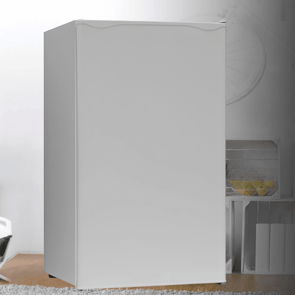 Mini fridge for bedroom with a single door, available in black, white, or red, perfect for storing beverages and snacks in a compact design. 1