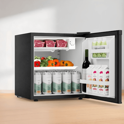 Compact mini fridge with freezer and adjustable temperature settings, ideal for dorms and small spaces, featuring a sleek design and energy-efficient functionality. 0