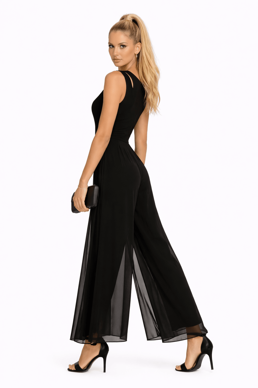 Elegant minimalist jumpsuit for women featuring a flowing silhouette, perfect for versatile styling and any occasion. 2