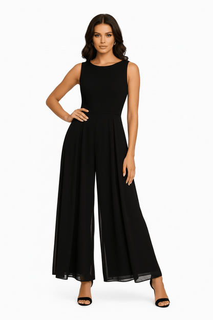 Elegant minimalist jumpsuit for women featuring a flowing silhouette, perfect for versatile styling and any occasion. 0