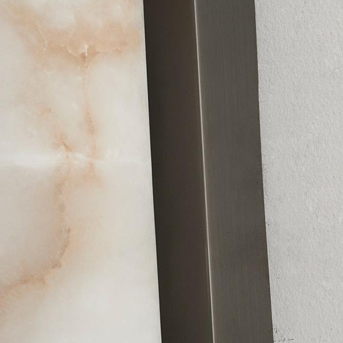 Minimalist LED wall lamp featuring integrated lighting and a stylish marble accent, designed for modern indoor spaces. 3