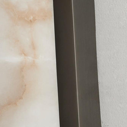 Minimalist LED wall lamp featuring integrated lighting and a stylish marble accent, designed for modern indoor spaces. 3