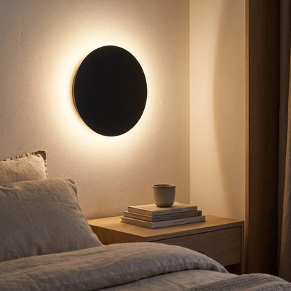 Minimalist LED wall light in black and white, featuring touch dimming and a wireless USB rechargeable design, perfect for modern home decor. 2