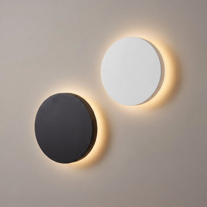 Minimalist LED wall light in black and white, featuring touch dimming and a wireless USB rechargeable design, perfect for modern home decor. 0