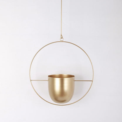 Minimalist plant hanger for hanging pots, featuring a modern metal design perfect for indoor use, showcasing versatility for various decor styles. 12
