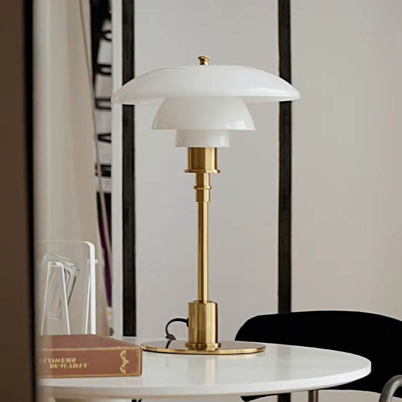 Minimalist table lamp featuring a warm LED light and elegant glass shade, ideal for bedside or desk use, with a sleek modern metal base. 7