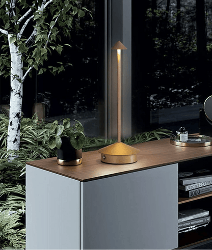 Minimalist wireless table lamp featuring a sleek design, dimmable LED functionality, and portability for indoor and outdoor use. 2