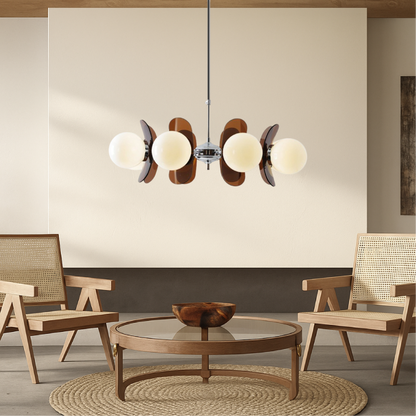 Modern chandelier light featuring an adjustable cable, showcasing a Bauhaus-inspired iron design complemented by elegant frosted glass spheres. 1