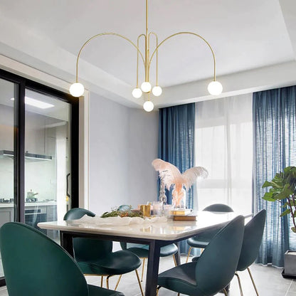 Elegant modern glass pendant light designed for kitchens and dining spaces, featuring a slim profile and available in multiple sizes, enhancing any contemporary decor. 3