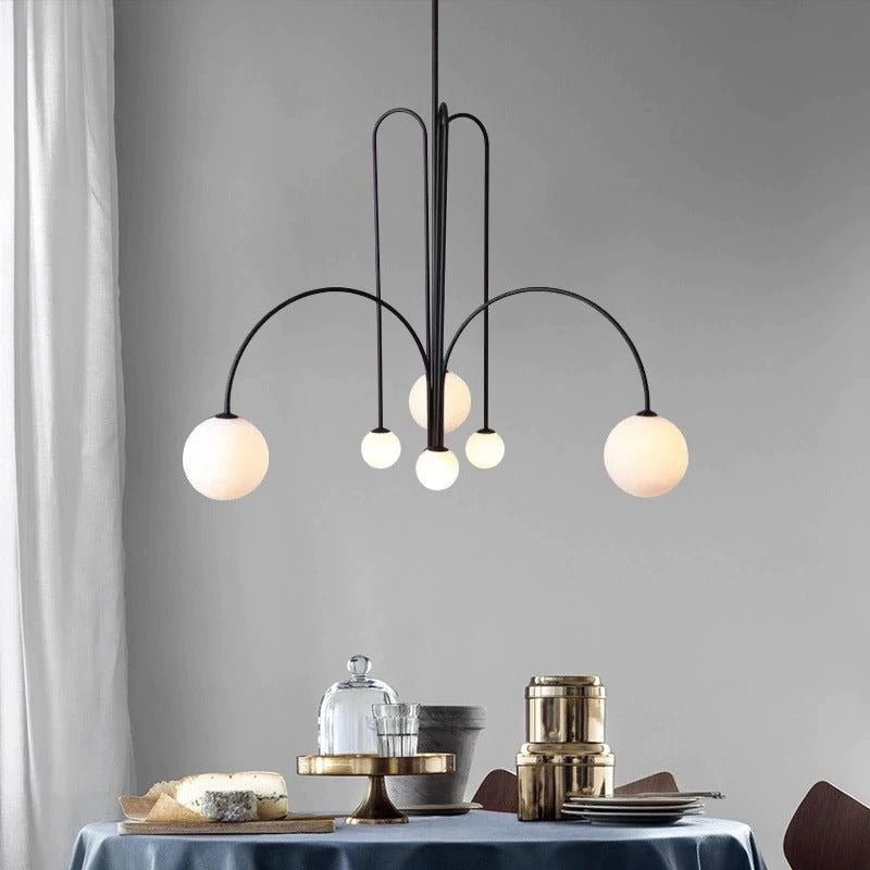 Elegant modern glass pendant light designed for kitchens and dining spaces, featuring a slim profile and available in multiple sizes, enhancing any contemporary decor. 2