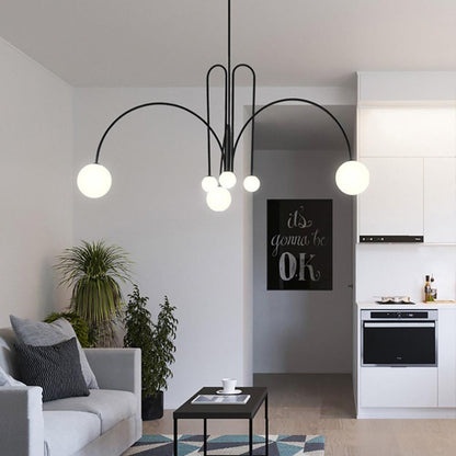 Elegant modern glass pendant light designed for kitchens and dining spaces, featuring a slim profile and available in multiple sizes, enhancing any contemporary decor. 5