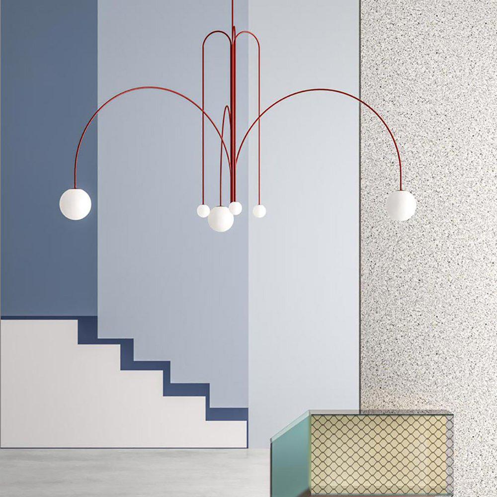 Elegant modern glass pendant light designed for kitchens and dining spaces, featuring a slim profile and available in multiple sizes, enhancing any contemporary decor. 4