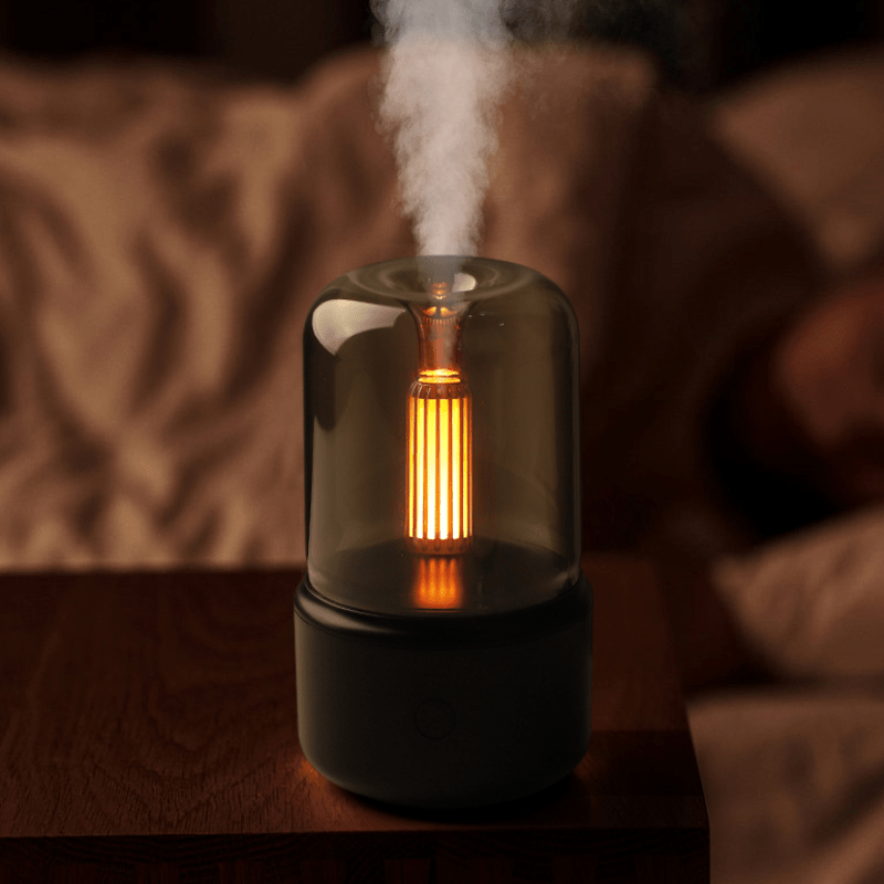 Modern LED aroma diffuser featuring a captivating flame effect, designed for essential oils, perfect for relaxation and enhancing home decor. 1