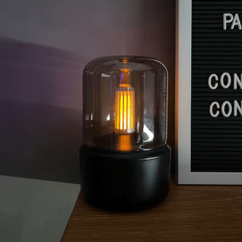 Modern LED aroma diffuser featuring a captivating flame effect, designed for essential oils, perfect for relaxation and enhancing home decor. 2
