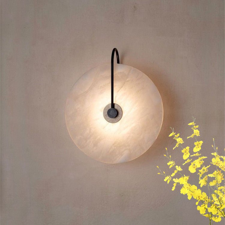 Modern LED wall lamp featuring a sleek golden arm and a stylish marble shade, perfect for minimalist home decor and elegant lighting solutions. 4