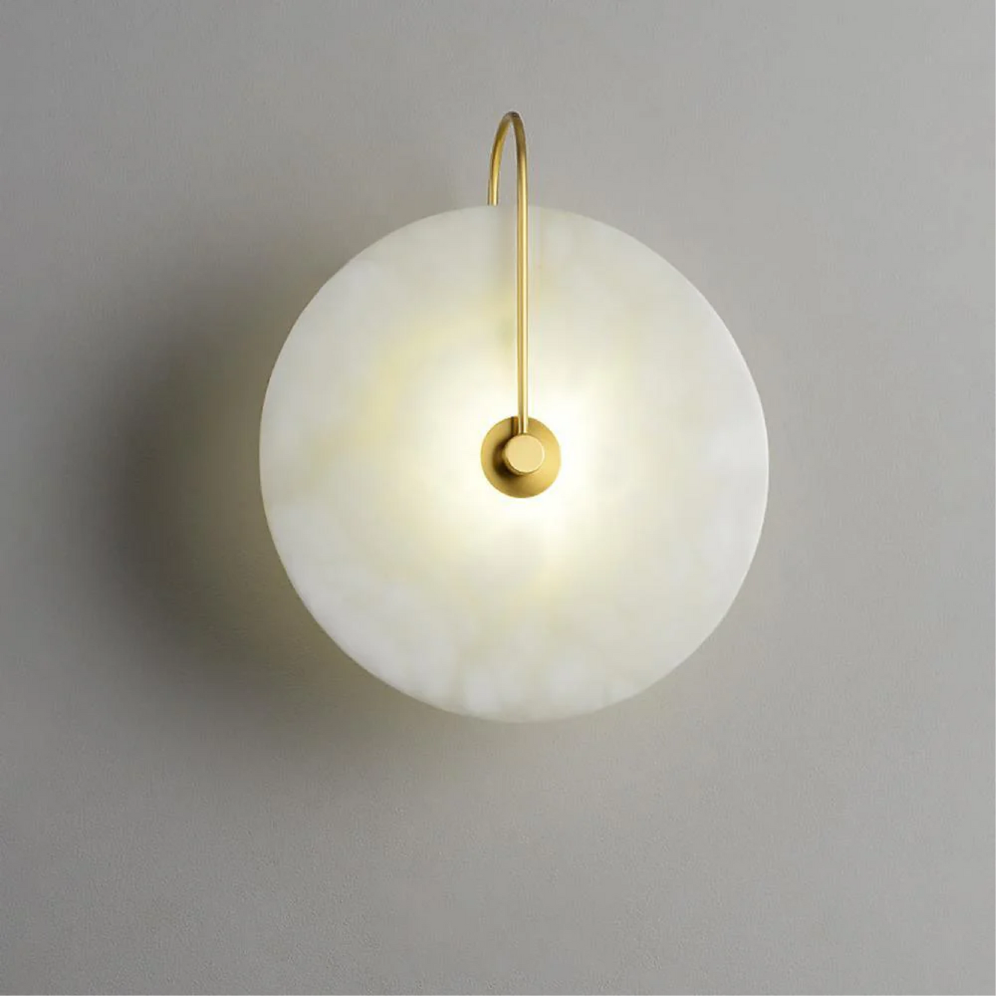 Modern LED wall lamp featuring a sleek golden arm and a stylish marble shade, perfect for minimalist home decor and elegant lighting solutions. 6