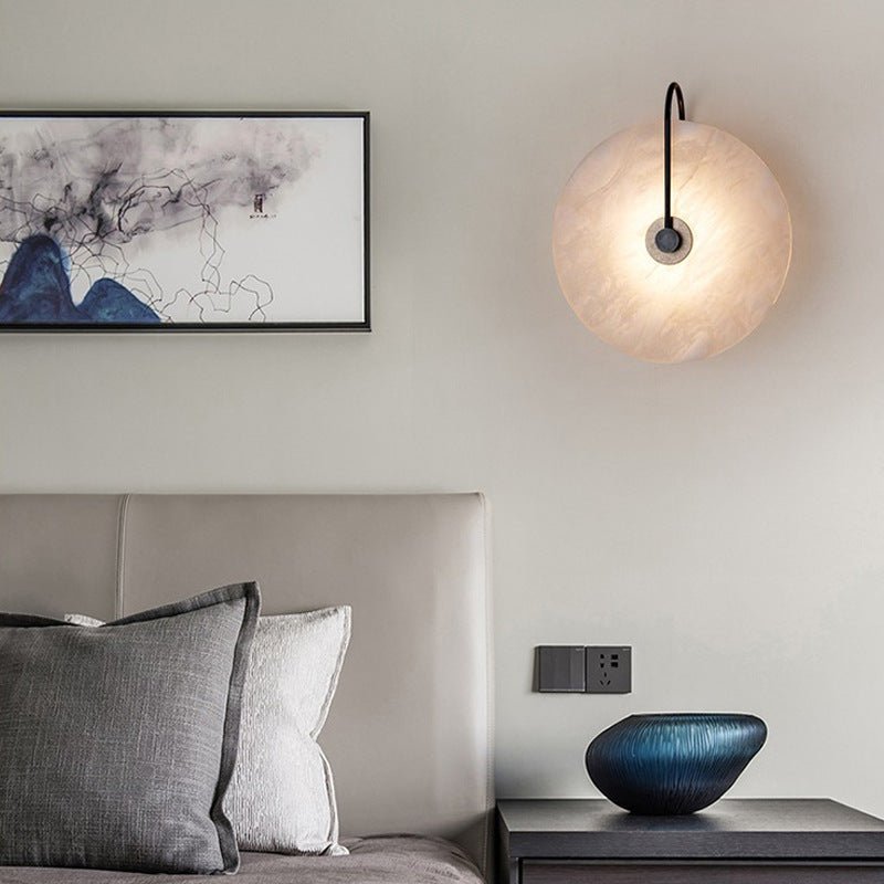 Modern LED wall lamp featuring a sleek golden arm and a stylish marble shade, perfect for minimalist home decor and elegant lighting solutions. 7