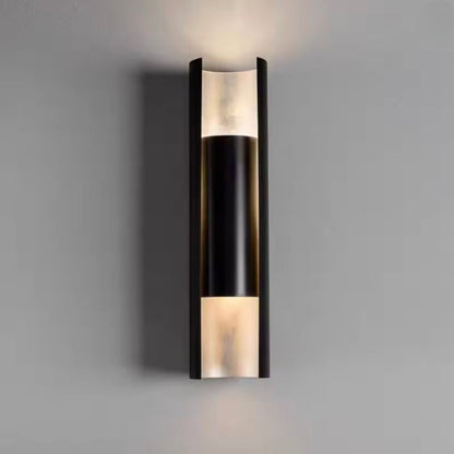 Modern minimalist wall lamp featuring a sleek stainless steel finish, designed to provide both upward and downward lighting for a contemporary ambiance in any room. 2