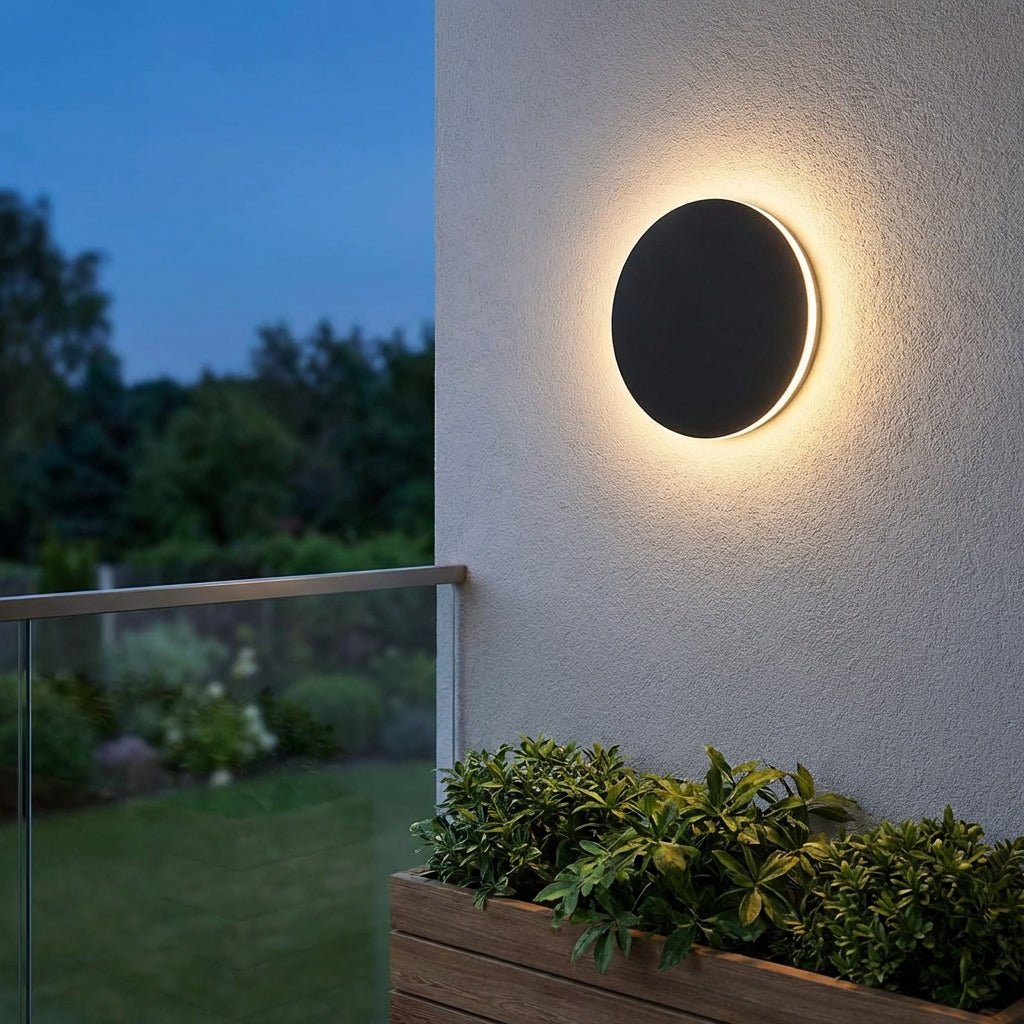 Modern outdoor wall lamp featuring a durable stainless steel round design, IP65 weatherproof rating, perfect for illuminating gardens and terraces. 0