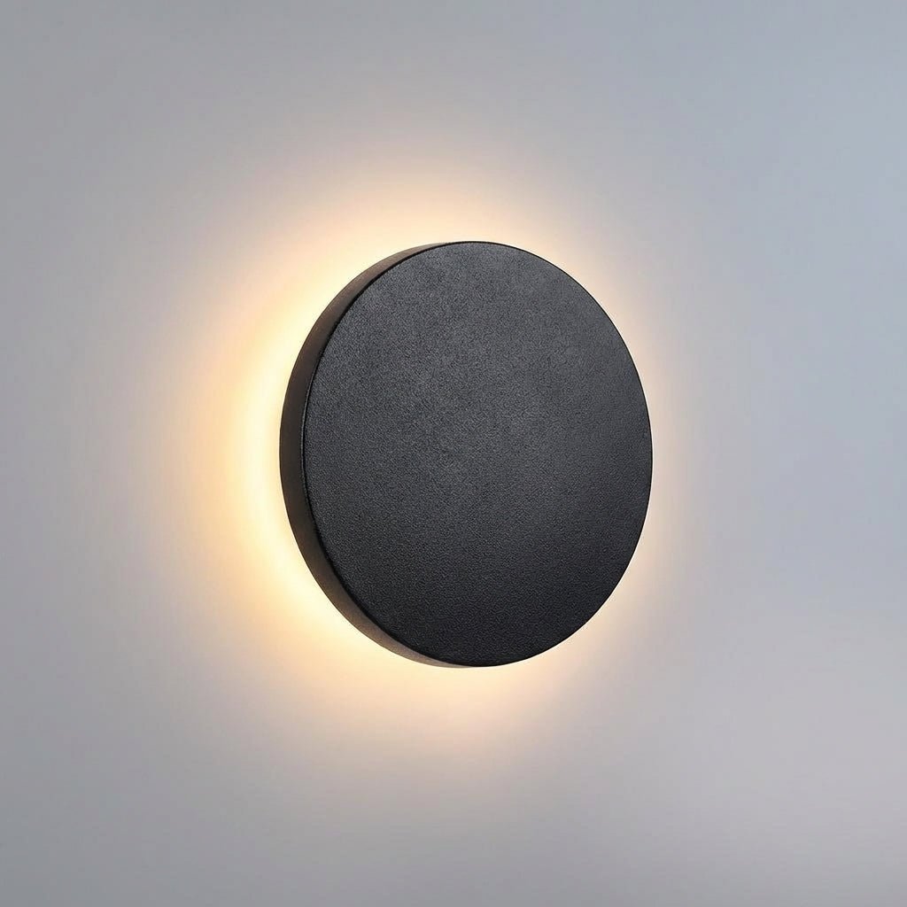 Modern outdoor wall lamp featuring a durable stainless steel round design, IP65 weatherproof rating, perfect for illuminating gardens and terraces. 1