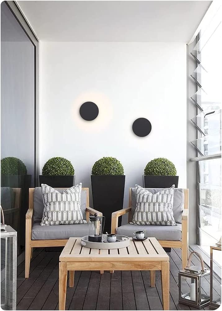 Modern outdoor wall lamp featuring a durable stainless steel round design, IP65 weatherproof rating, perfect for illuminating gardens and terraces. 3