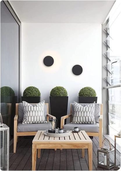 Modern outdoor wall lamp featuring a durable stainless steel round design, IP65 weatherproof rating, perfect for illuminating gardens and terraces. 3