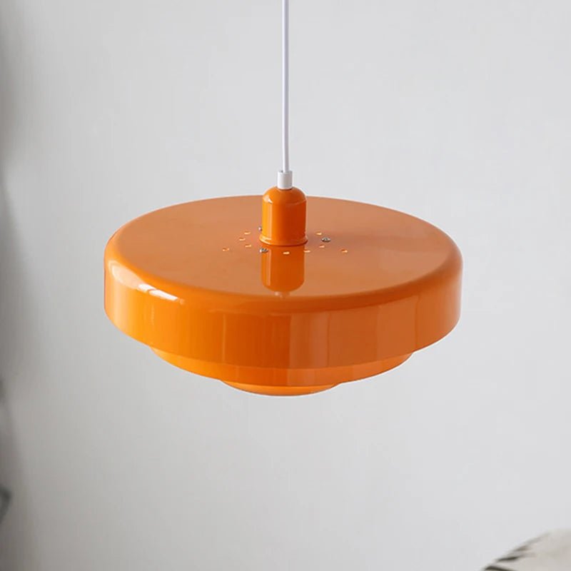 Modern pendant light featuring a Scandinavian minimalist design, adjustable height, perfect for illuminating kitchen islands and dining areas. 3
