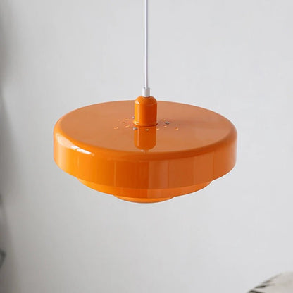 Modern pendant light featuring a Scandinavian minimalist design, adjustable height, perfect for illuminating kitchen islands and dining areas. 3