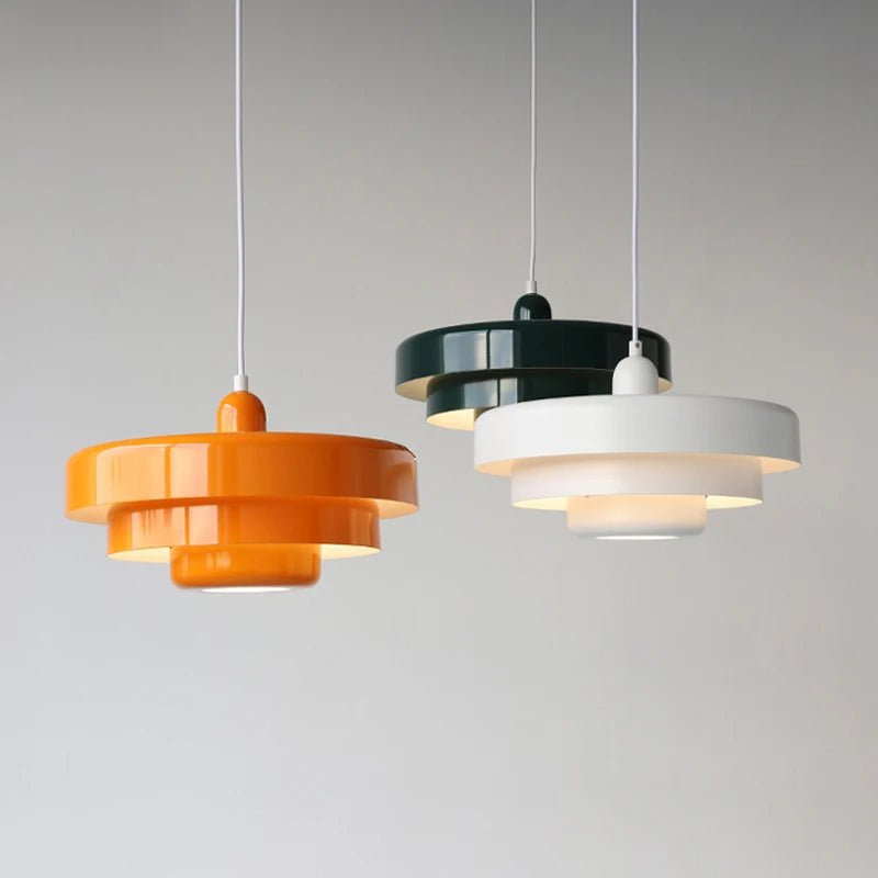 Modern pendant light featuring a Scandinavian minimalist design, adjustable height, perfect for illuminating kitchen islands and dining areas. 1