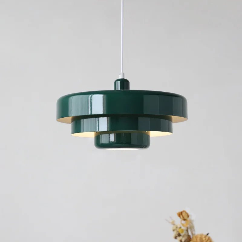 Modern pendant light featuring a Scandinavian minimalist design, adjustable height, perfect for illuminating kitchen islands and dining areas. 5