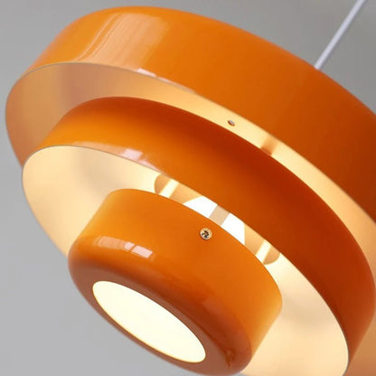 Modern pendant light featuring a Scandinavian minimalist design, adjustable height, perfect for illuminating kitchen islands and dining areas. 2