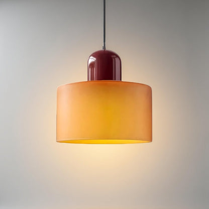 Modern pendant light featuring a sleek design with a glass shade, ideal for illuminating kitchen islands and dining areas. 1