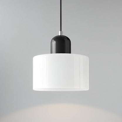 Modern pendant light featuring a sleek design with a glass shade, ideal for illuminating kitchen islands and dining areas. 30