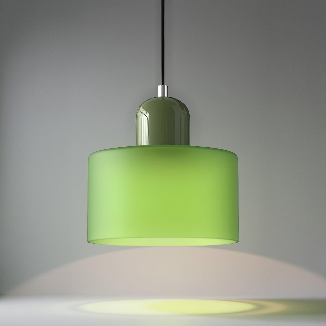 Modern pendant light featuring a sleek design with a glass shade, ideal for illuminating kitchen islands and dining areas. 16