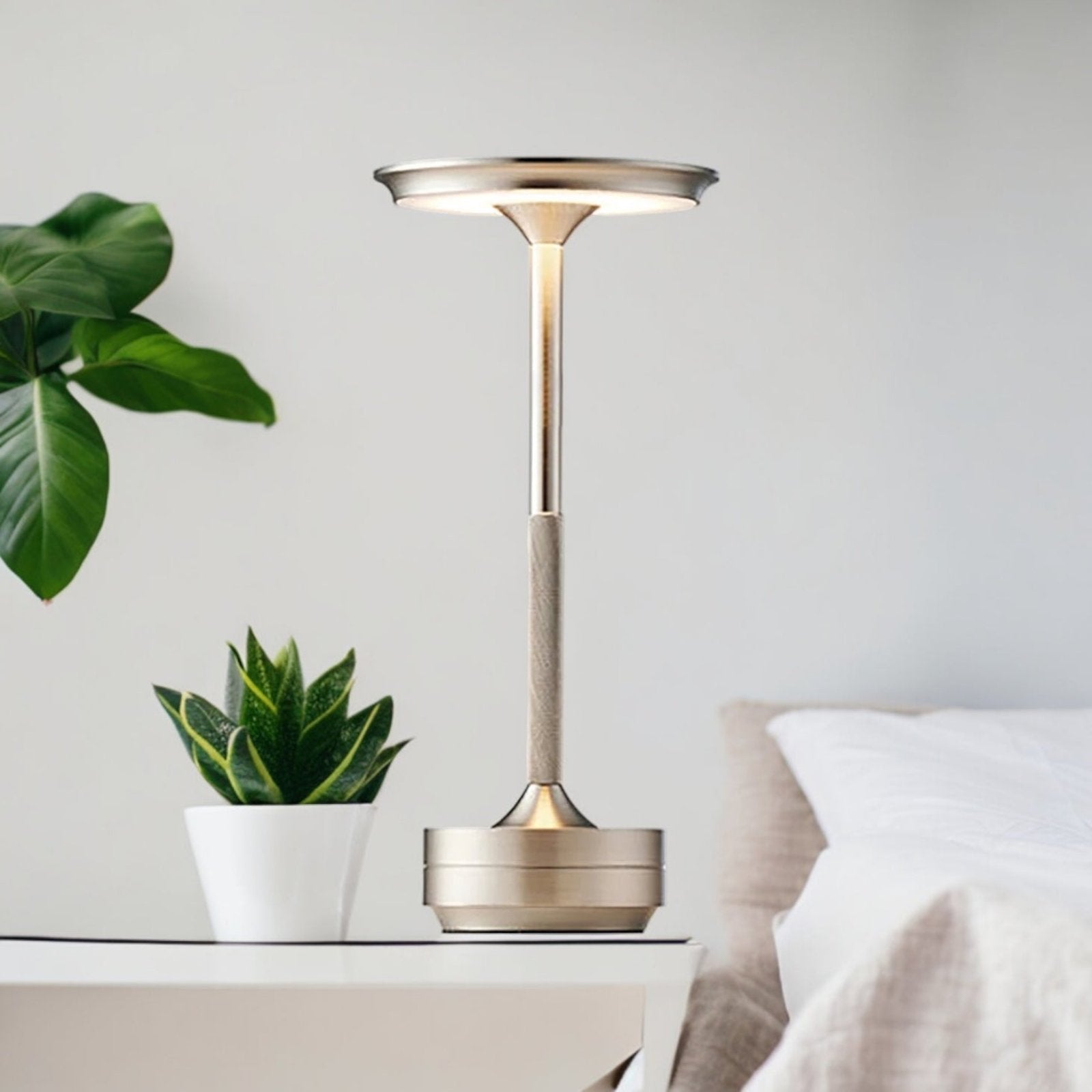 Modern table lamp featuring adjustable LED light, cordless and waterproof design, perfect for both indoor and outdoor settings. 4