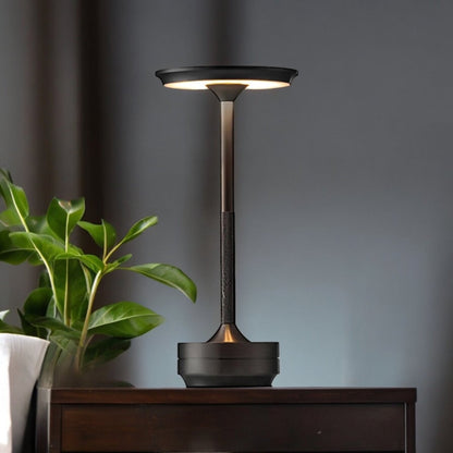 Modern table lamp featuring adjustable LED light, cordless and waterproof design, perfect for both indoor and outdoor settings. 5