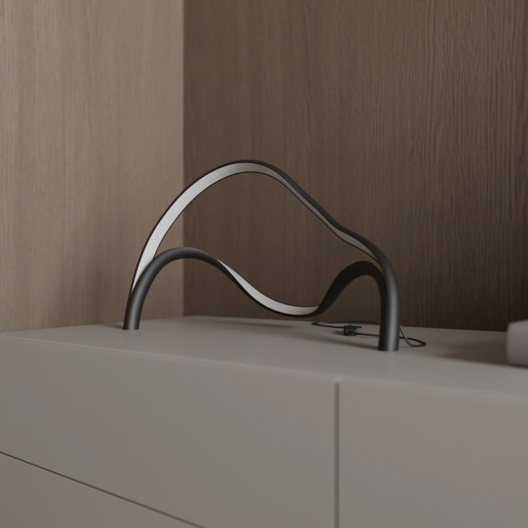 Modern table lamp featuring an integrated LED light with a sleek metal and acrylic finish, designed for compact use on bedside tables or desks. 3