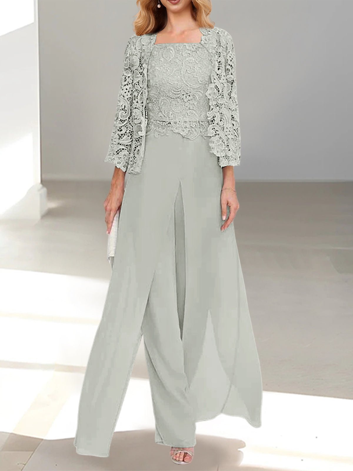 Elegant Mother of the Bride pantsuit featuring a stylish jacket and split side design, crafted from floor-length chiffon in sophisticated silver gray. 31
