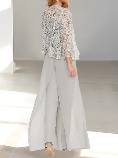 Elegant Mother of the Bride pantsuit featuring a stylish jacket and split side design, crafted from floor-length chiffon in sophisticated silver gray. 1