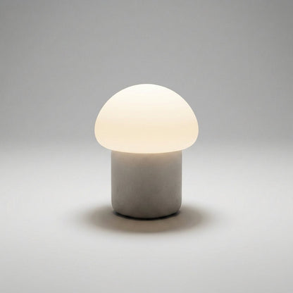 Mushroom table lamp featuring a modern minimalist design with soft LED light, perfect for bedside and nightstand use. 4