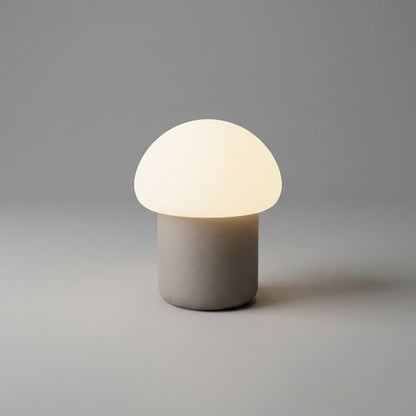 Mushroom table lamp featuring a modern minimalist design with soft LED light, perfect for bedside and nightstand use. 11