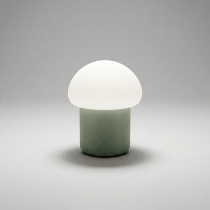Mushroom table lamp featuring a modern minimalist design with soft LED light, perfect for bedside and nightstand use. 10