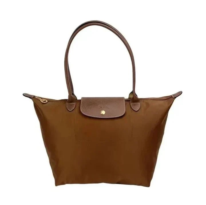 Natural leather handbag featuring a spacious interior, ideal for work and travel, with an elegant design perfect for daily use, dimensions 30cm x 19 0