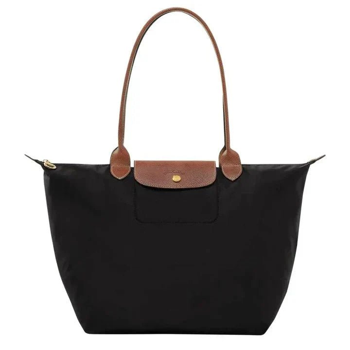Natural leather handbag featuring a spacious interior, ideal for work and travel, with an elegant design perfect for daily use, dimensions 30cm x 19 8