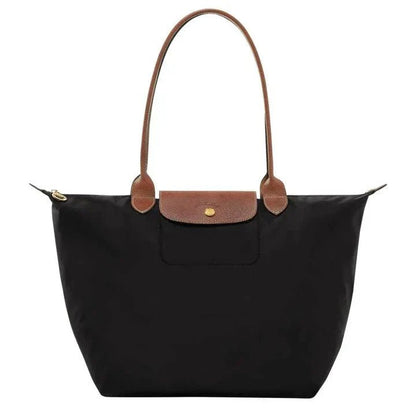 Natural leather handbag featuring a spacious interior, ideal for work and travel, with an elegant design perfect for daily use, dimensions 30cm x 19 8
