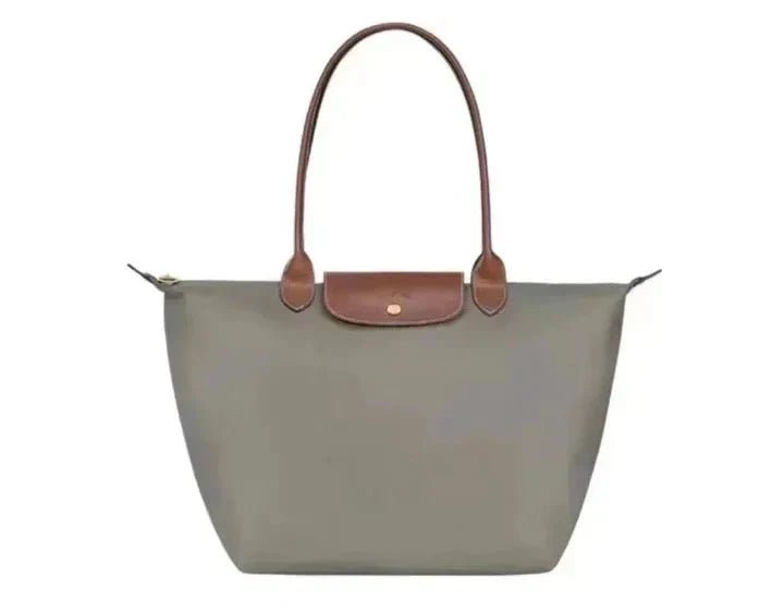 Natural leather handbag featuring a spacious interior, ideal for work and travel, with an elegant design perfect for daily use, dimensions 30cm x 19 4
